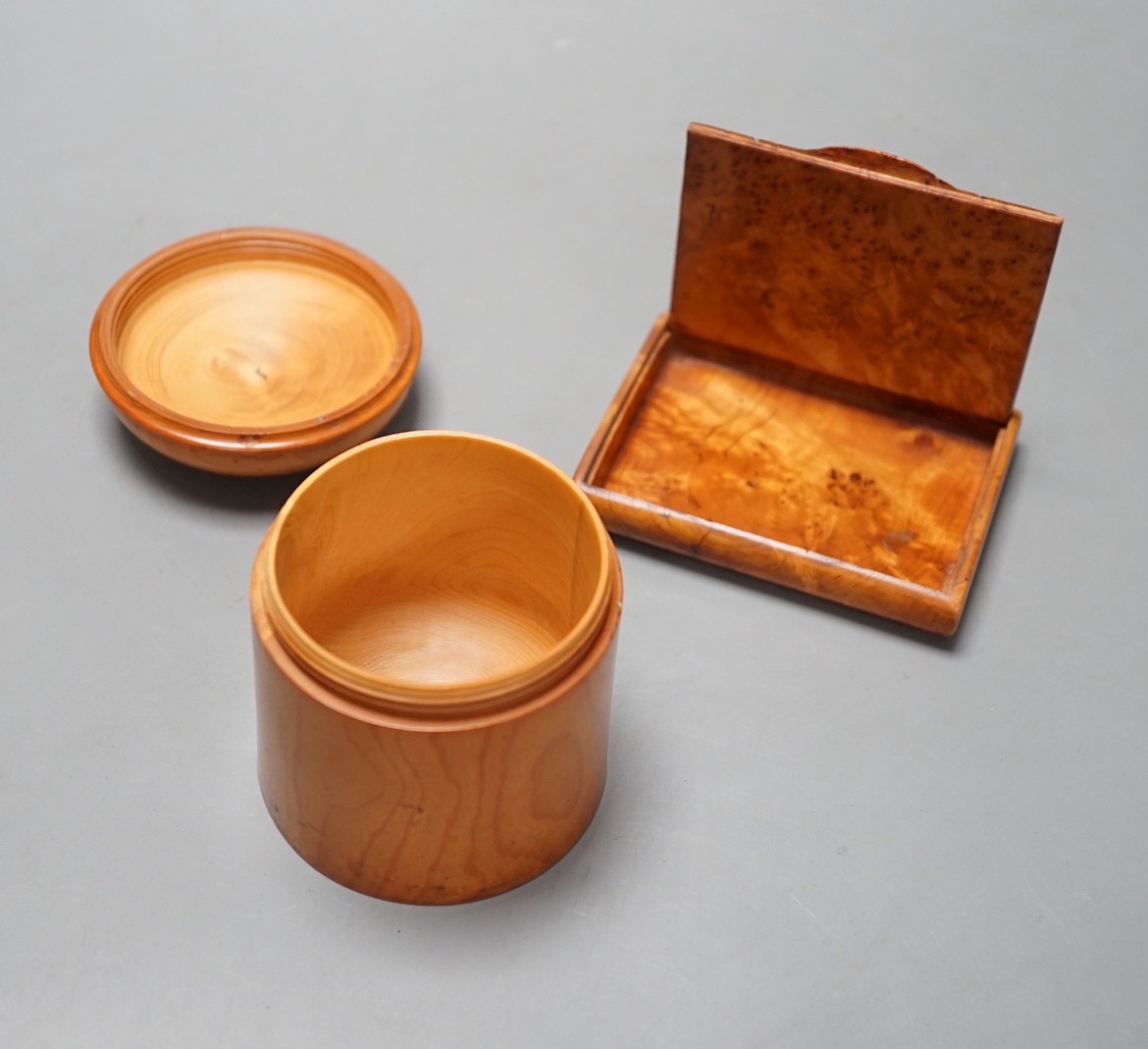A burr walnut snuff box and another treen box, 8.5cm tall